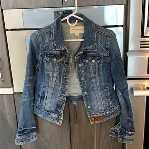 Distressed denim jacket